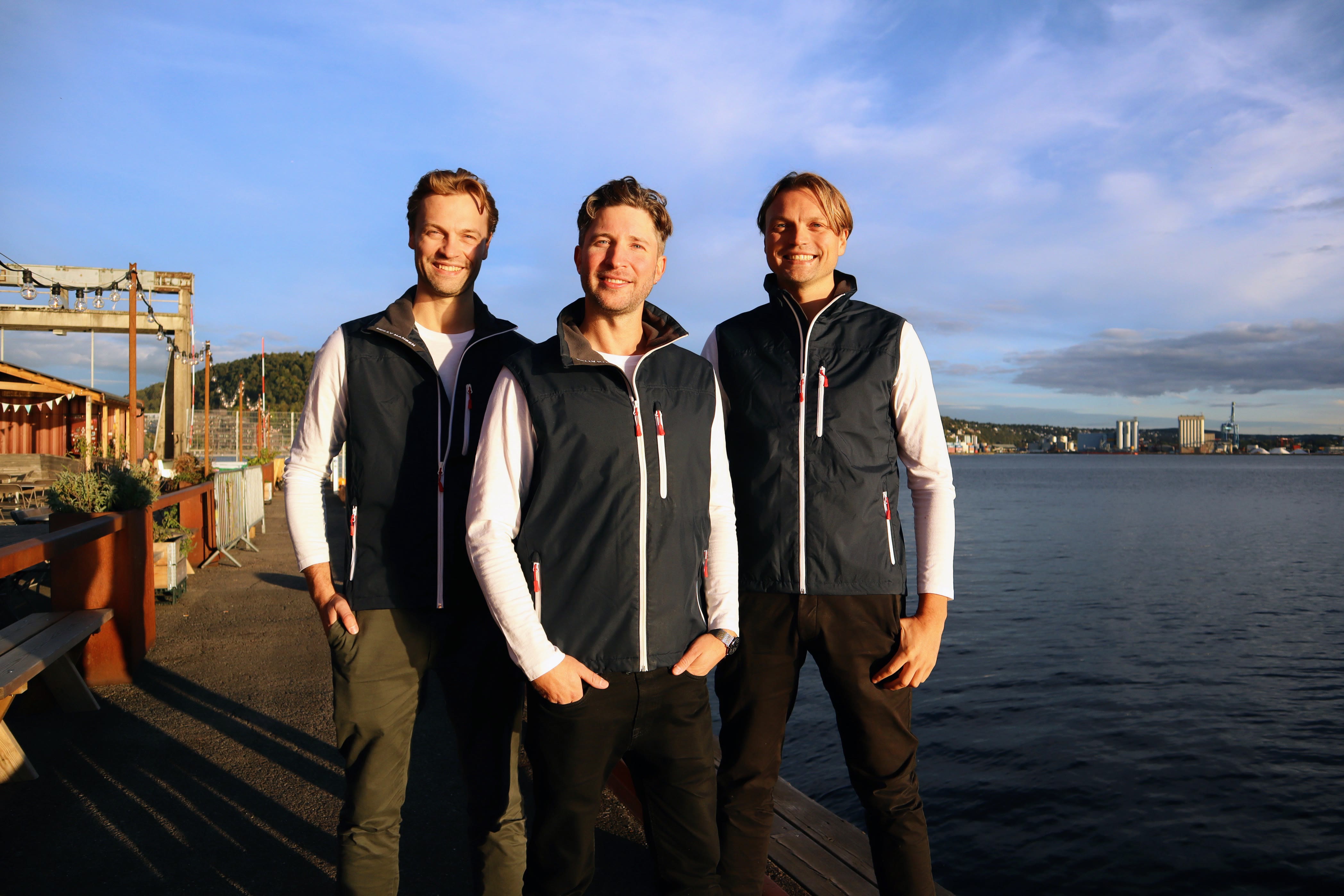 Simon, Are, and Adrian on the pier at the Oslo waterfront